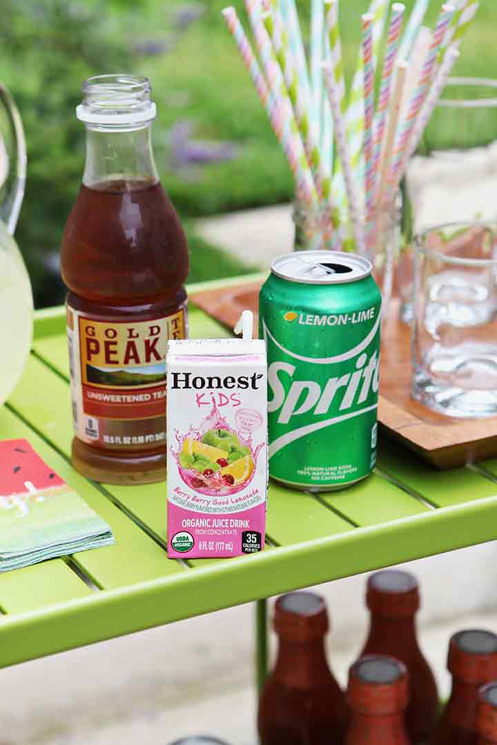 Iced Coca Cola products are shown on an Outdoor Drink Station