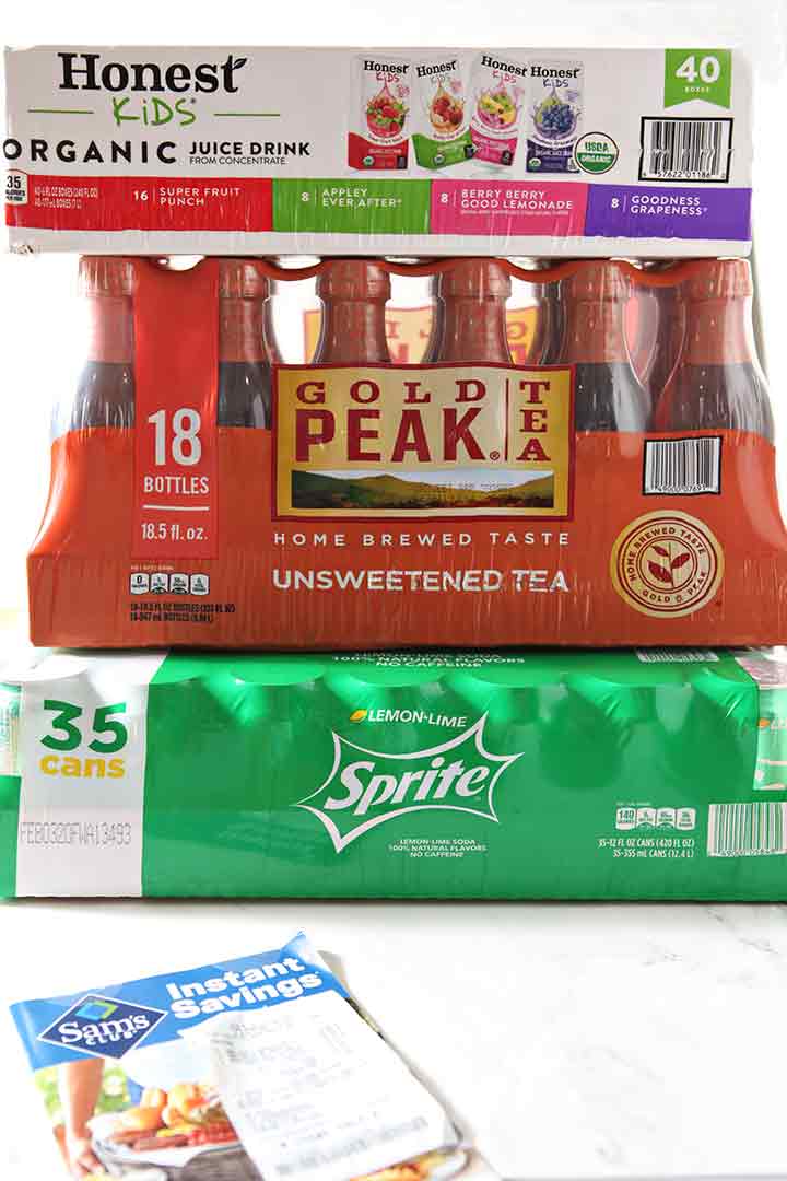 Honest Juice, Gold Peak Tea and Sprite packages are stacked on top of one another