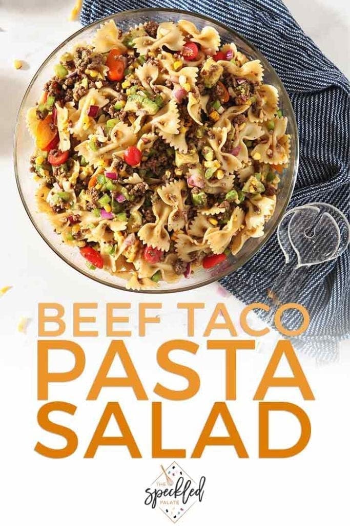 Pinterest image for Beef Taco Pasta Salad, featuring a close up of the tossed salad