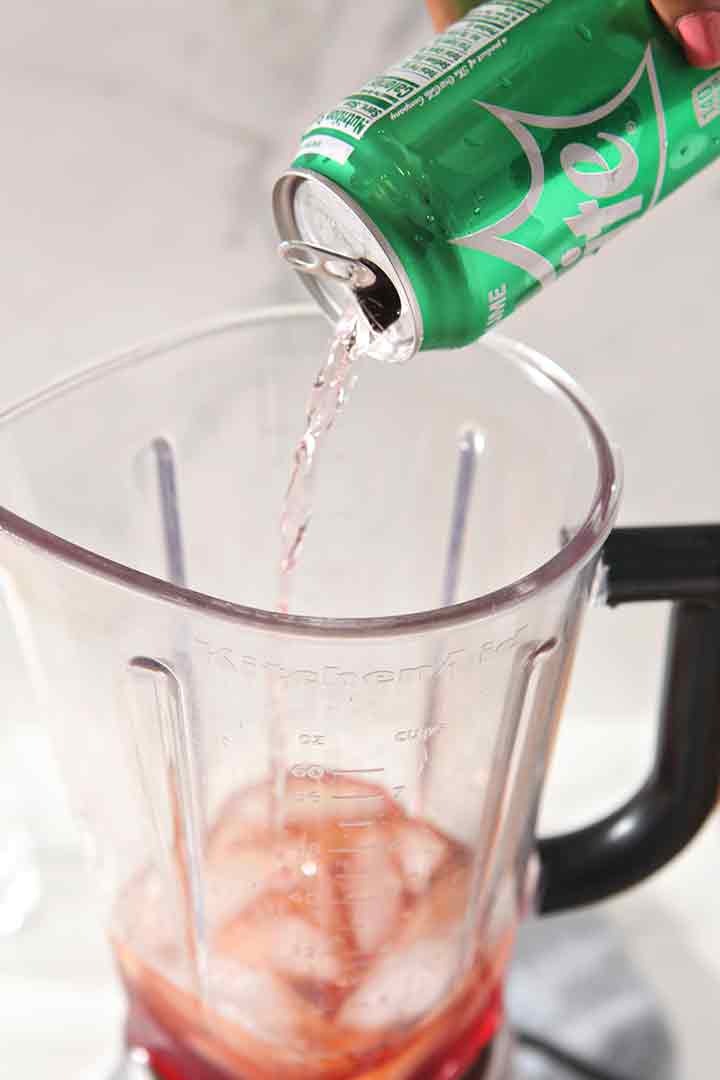 Sprite is poured into the blender