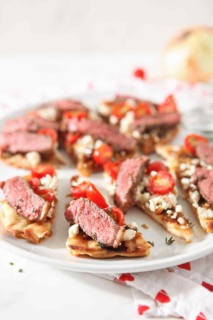 Close up of Grilled Steak Flatbread, sliced