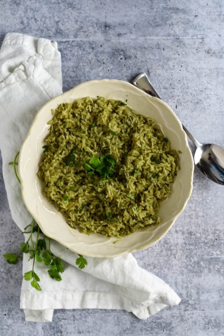 A bowl of Arroz Verde, seen from above