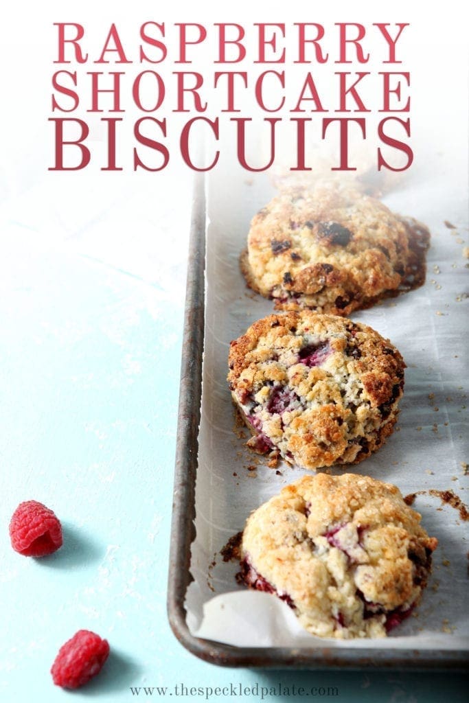 Raspberry Shortcake Biscuits line a baking sheet, after baking, with Pinterest text