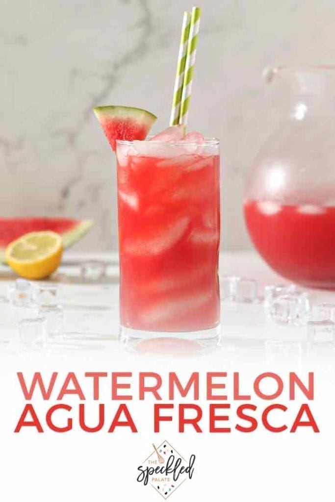 Close up of a glass of Watermelon Agua Fresca, surrounded by ice, with Pinterest text