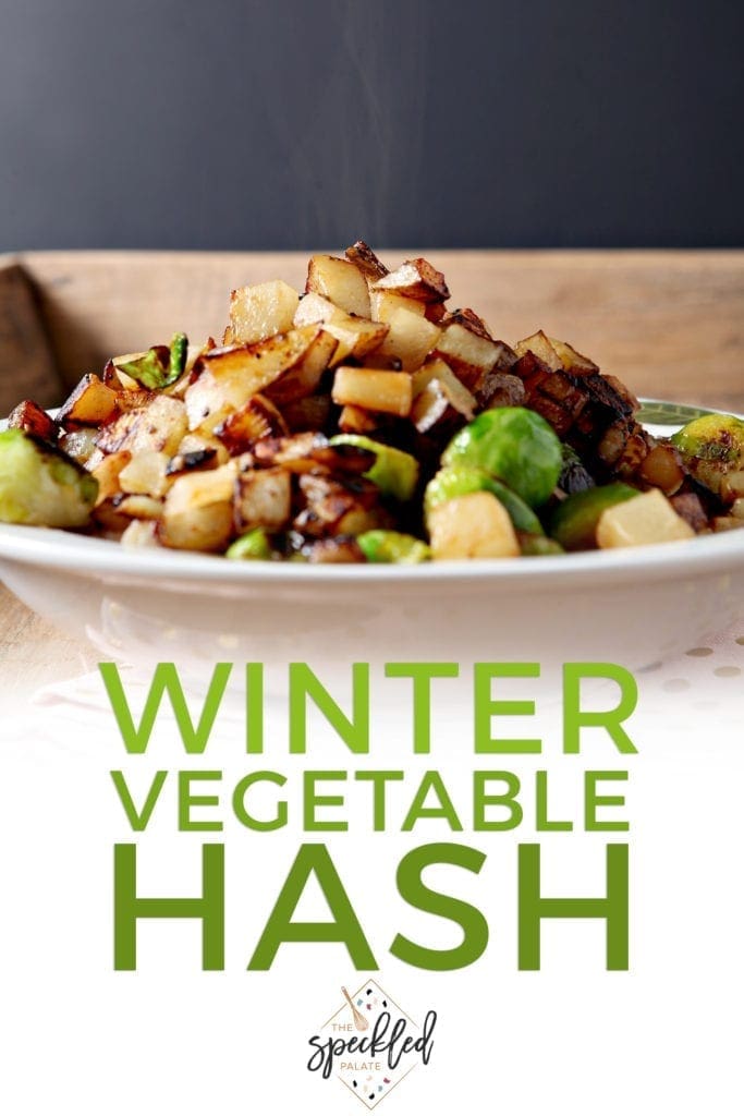 Steam rises from a bowl of Winter Vegetable Hash, with Pinterest text