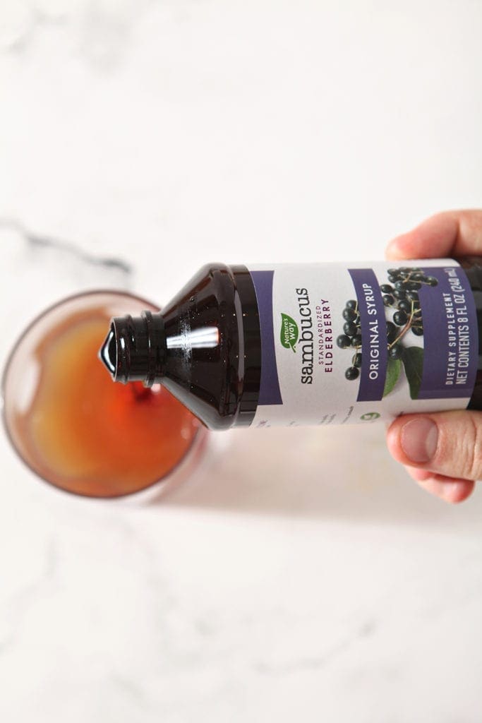 Nature’s Way Sambucus Original Syrup is poured into a glass with the other ingredients