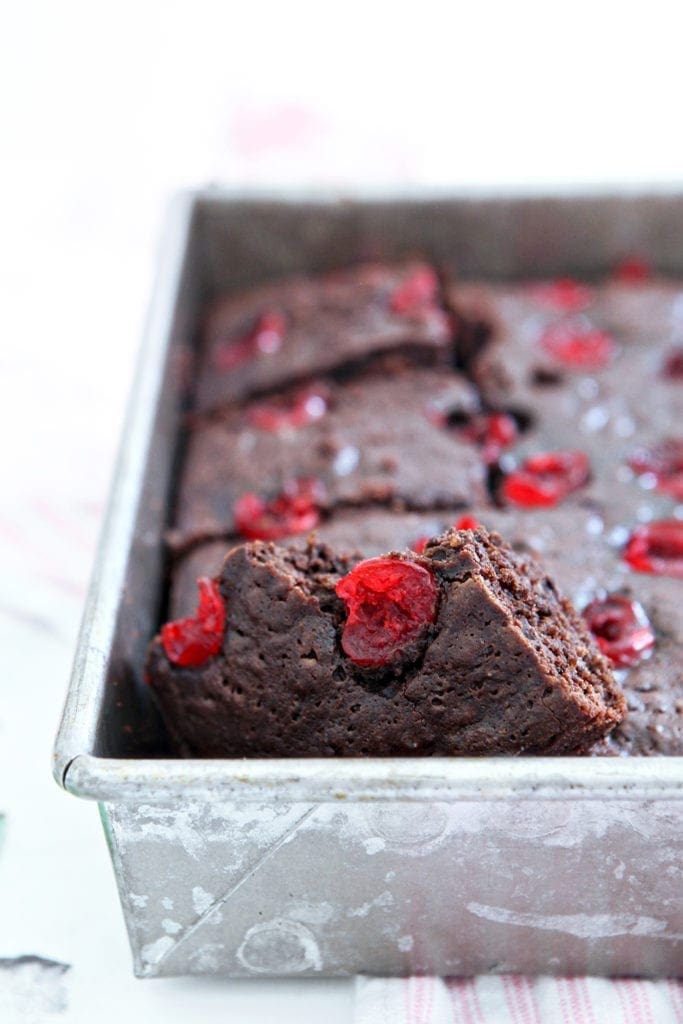 Dr Pepper Chocolate Cherry Brownies in a pan, after being sliced