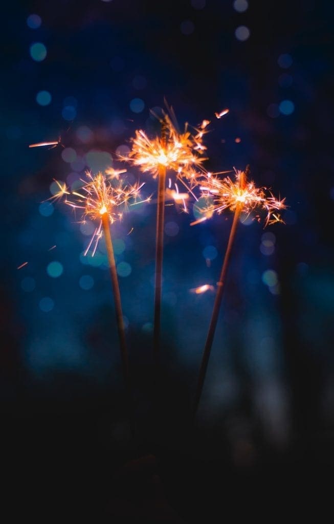 Sparklers, on a dark background