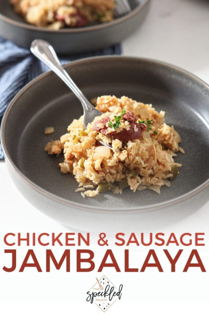 Close up of Chicken and Sausage Jambalaya in a bowl, with Pinterest text