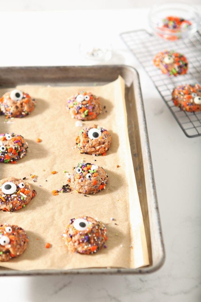 Halloween Funfetti Cookies on a sheet pan, after baking