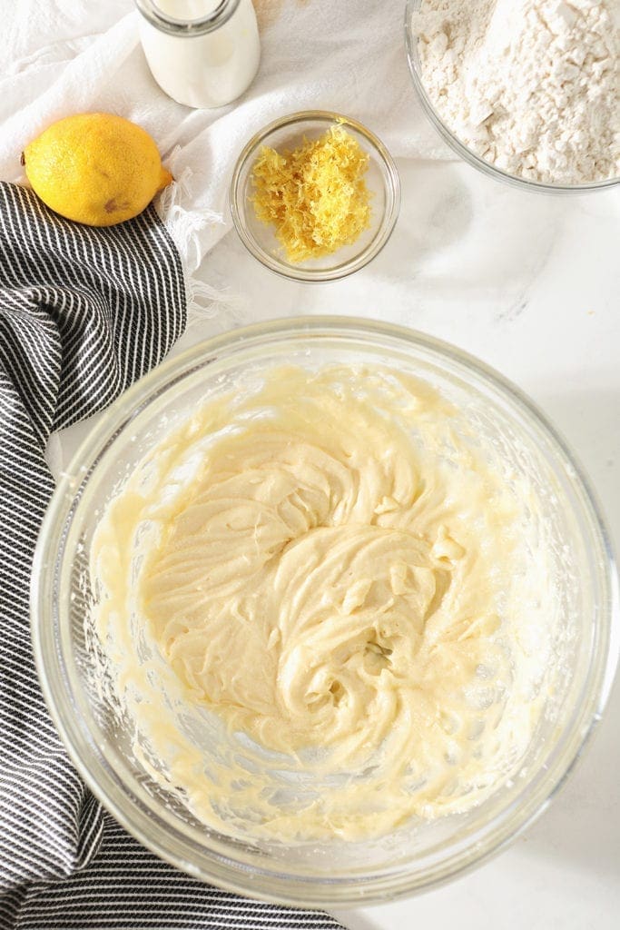 Sugar, butter, egg and vanilla are blended in a bowl, from above