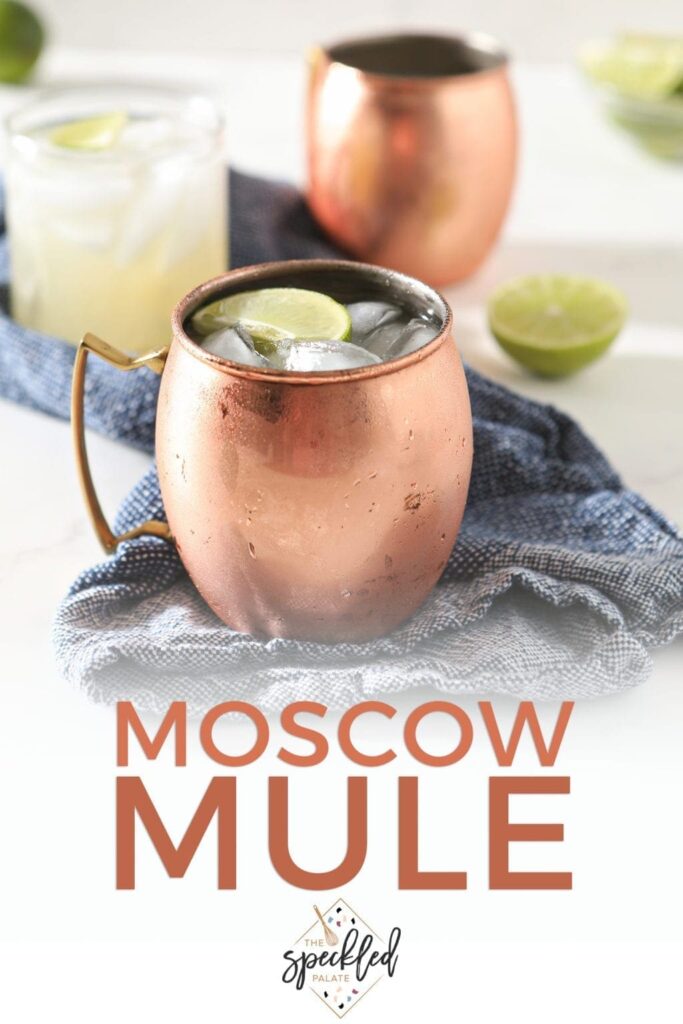 Three Moscow Mules are shown on a blue towel, with Pinterest text