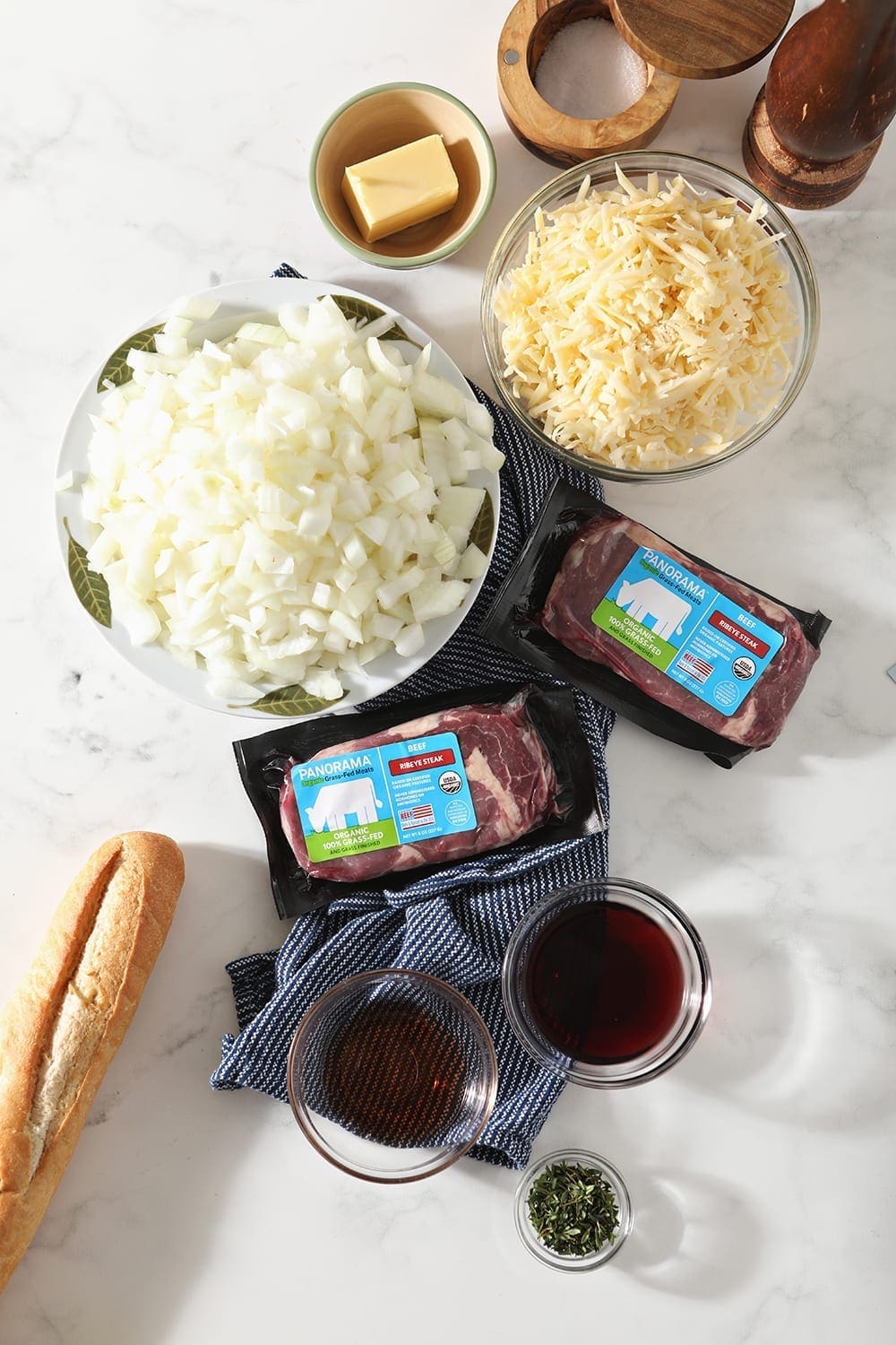 Overhead image of ingredients in bowls to make Steak Bruschetta with French Onion Marmalade in bowls