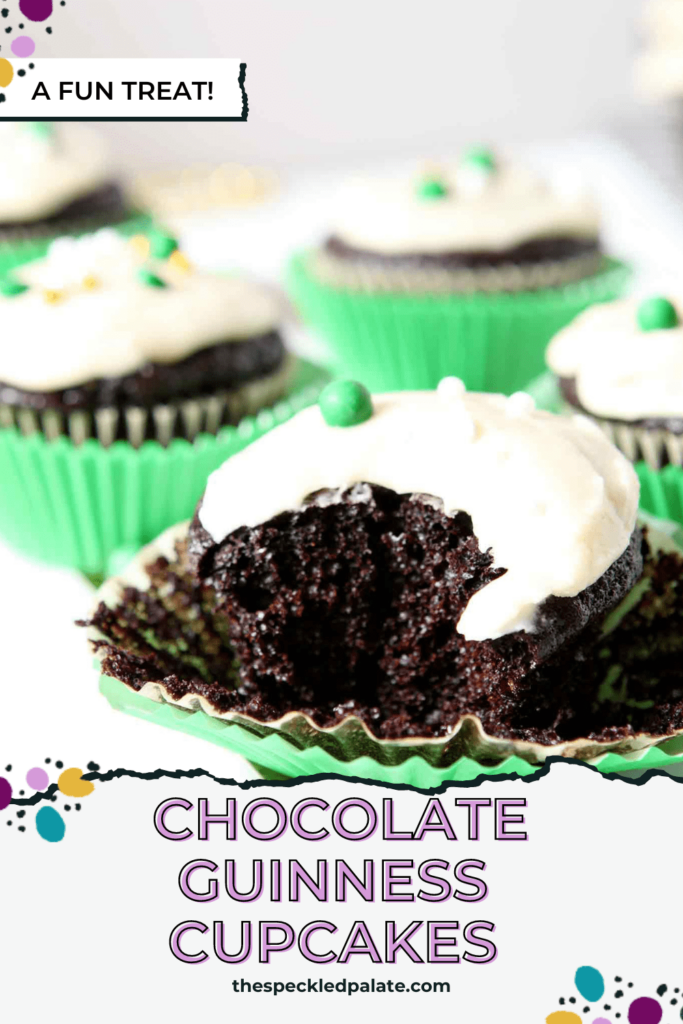 Close up of a bitten-into chocolate cupcake with white icing with the text Chocolate Guinness Cupcakes