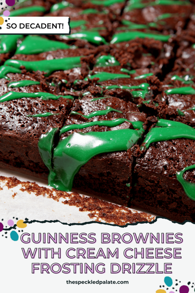 Close up of sliced brownies drizzled with green frosting in a pan with the text Guinness Brownies with Cream Cheese Frosting Drizzle