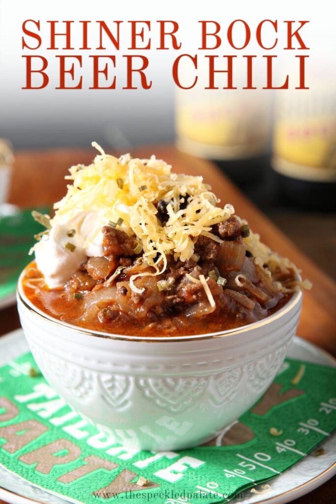 Pinterest image for Shiner Bock Beer Chili, featuring a close up of one bowl, from the side