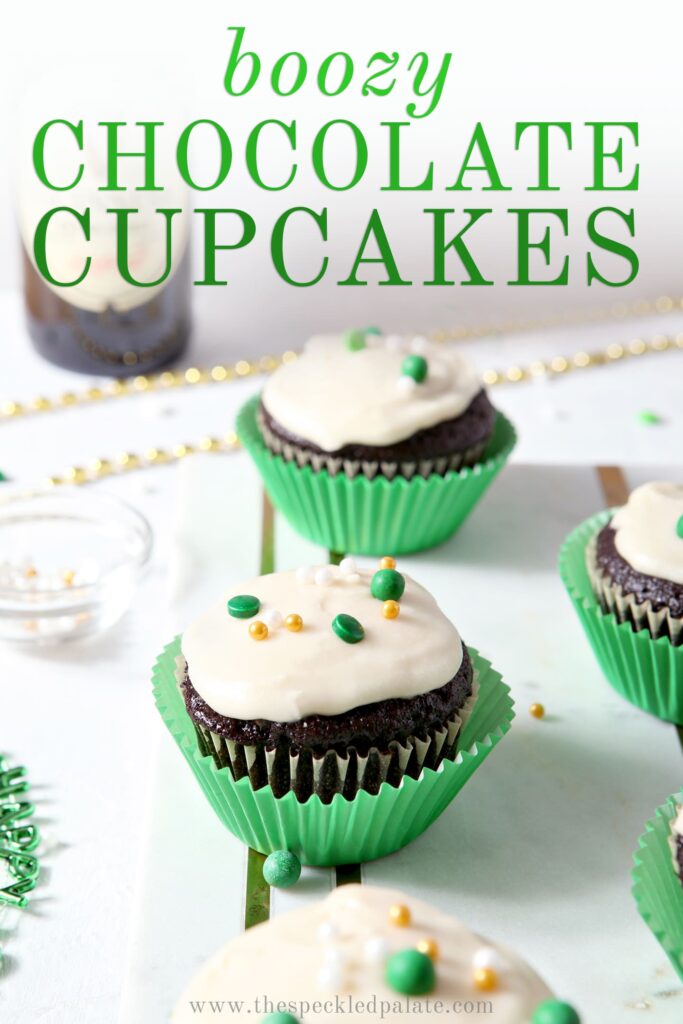 Chocolate Guinness Cupcakes are displayed on a marble board, with Pinterest text