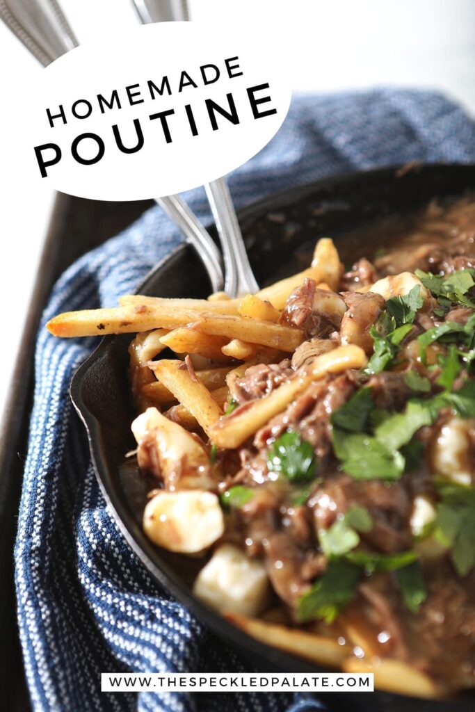 Close up of a skillet of Beef Poutine Fries and Gravy with Pinterest text