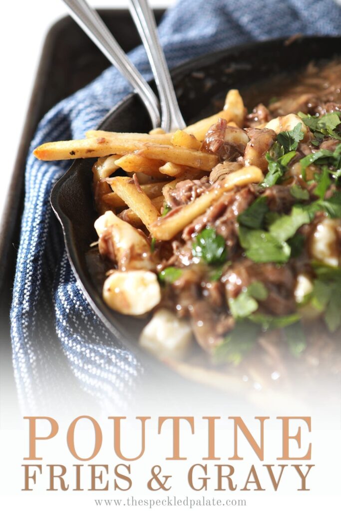 Close up of a skillet of Beef Poutine Fries and Gravy with Pinterest text