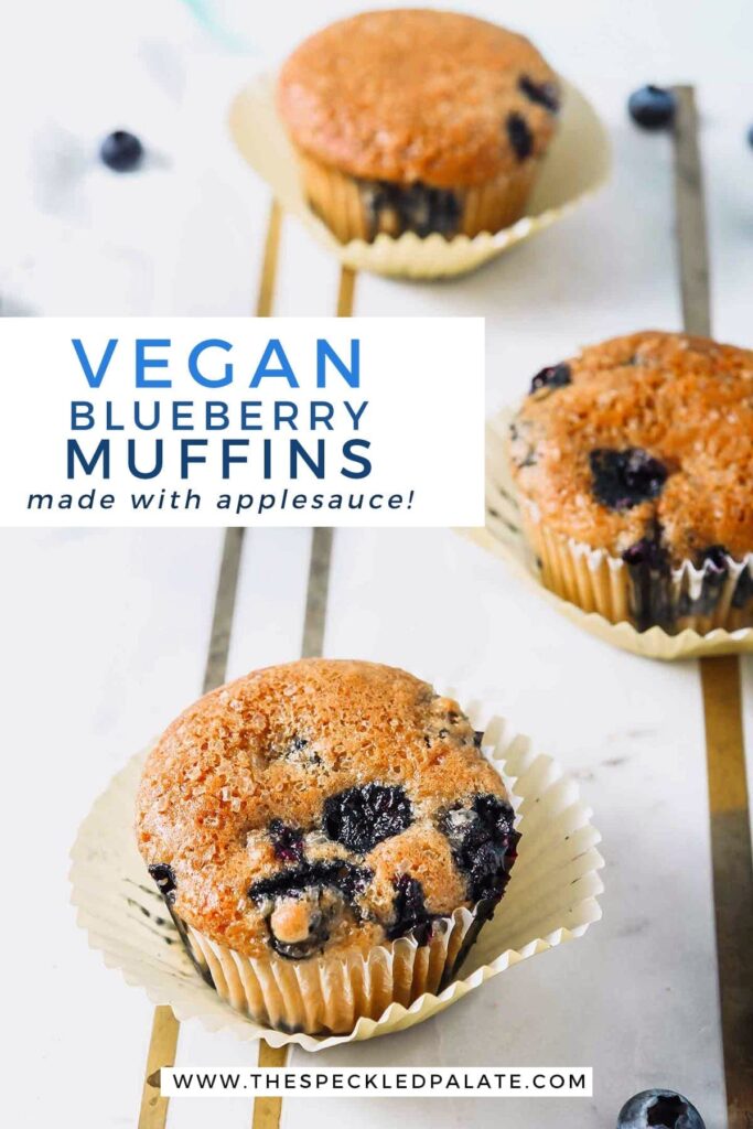 Three Vegan Blueberry Muffins on a marble serving platter, with Pinterest text