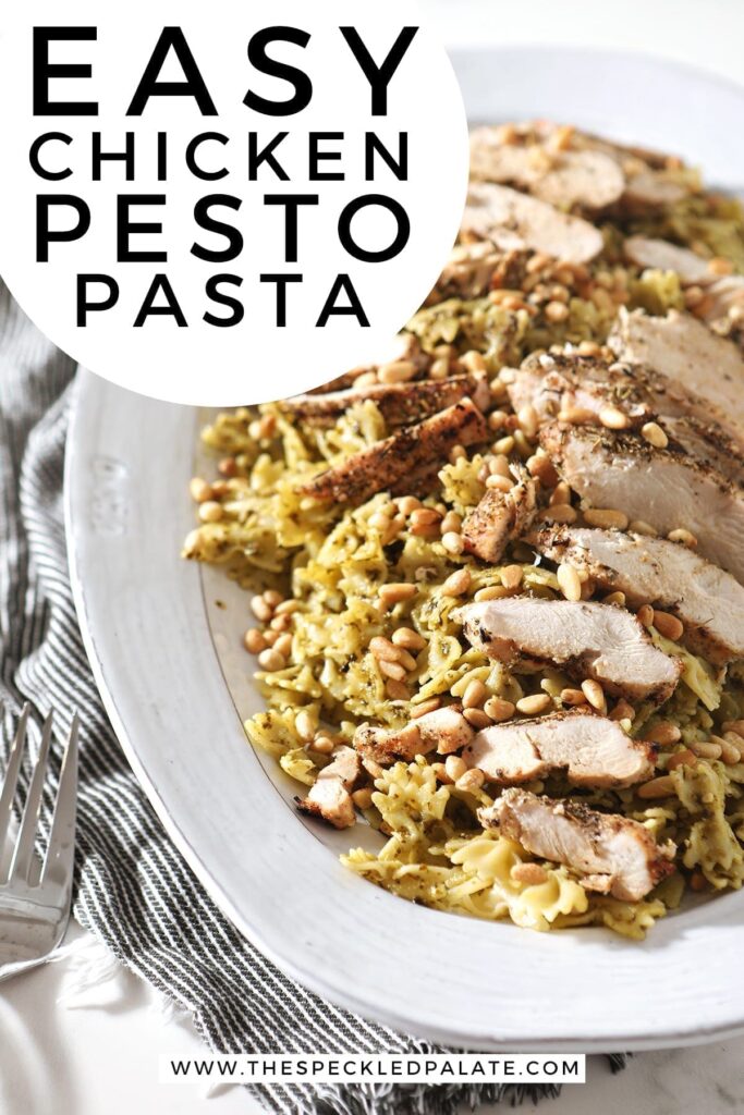 A platter holds the Chicken Pesto Pasta, before serving, with Pinterest text