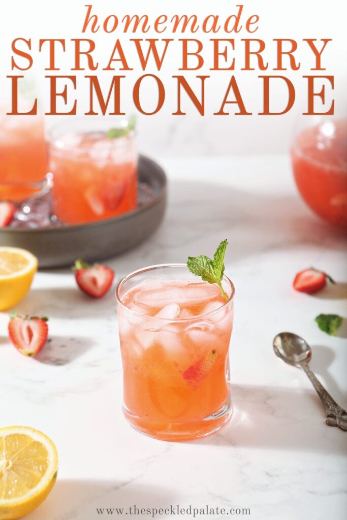 A glass of Strawberry Lemonade is shown with fresh strawberries and lemon slices with text