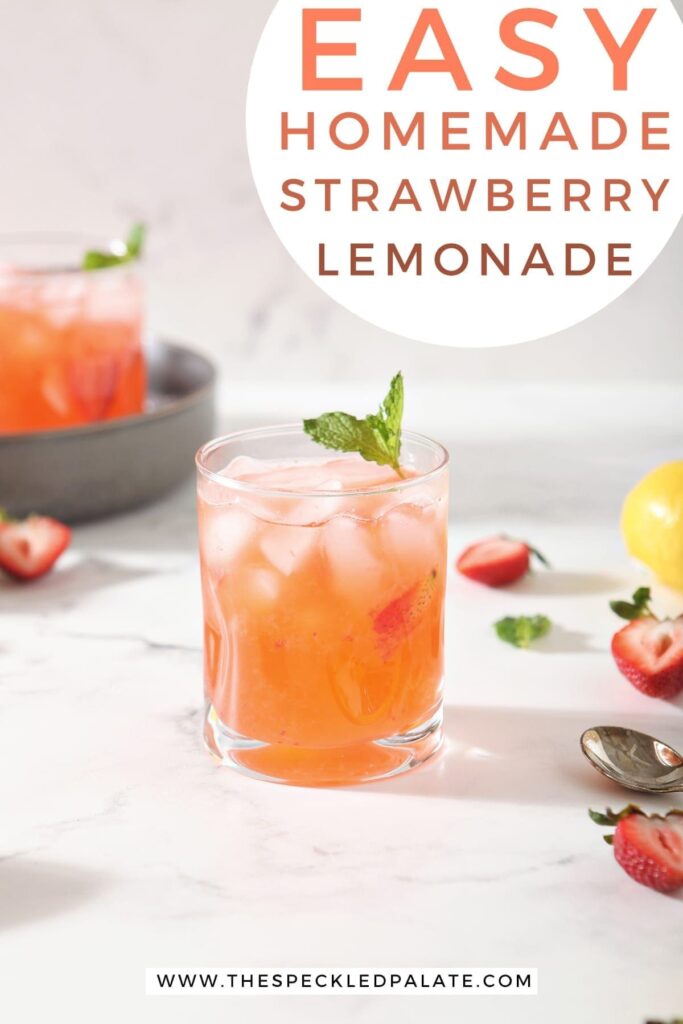 A glass of Strawberry Lemonade is shown with fresh strawberries and lemon slices with a circle of text at the top