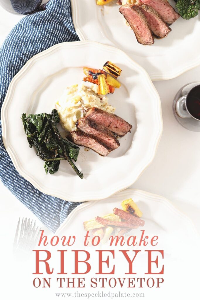 Overhead of three white plates holding sliced steak with potatoes, greens and carrots with text 'how to make ribeye on the stovetop'