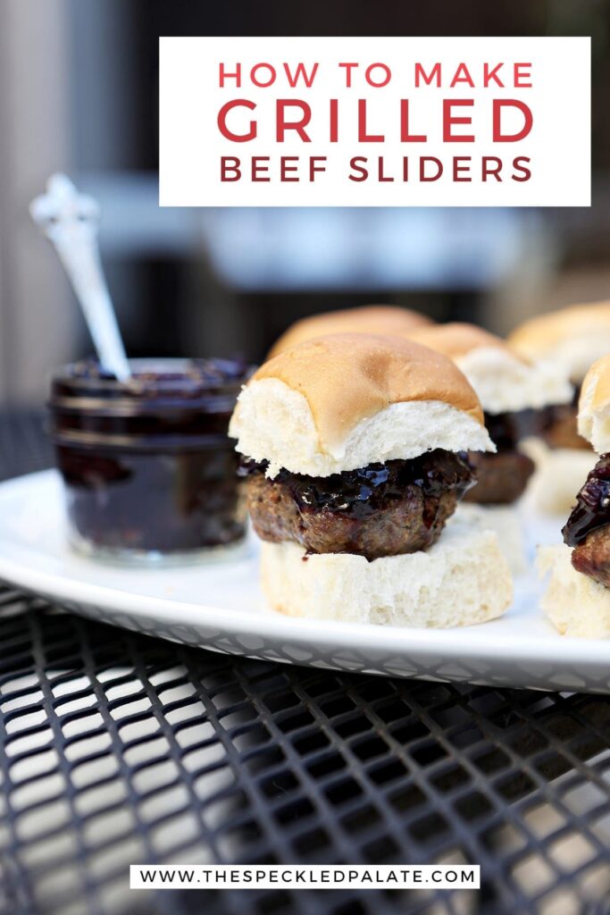 Hamburger sliders on a white platter on an outdoor table with the text "how to make grilled beef sliders"