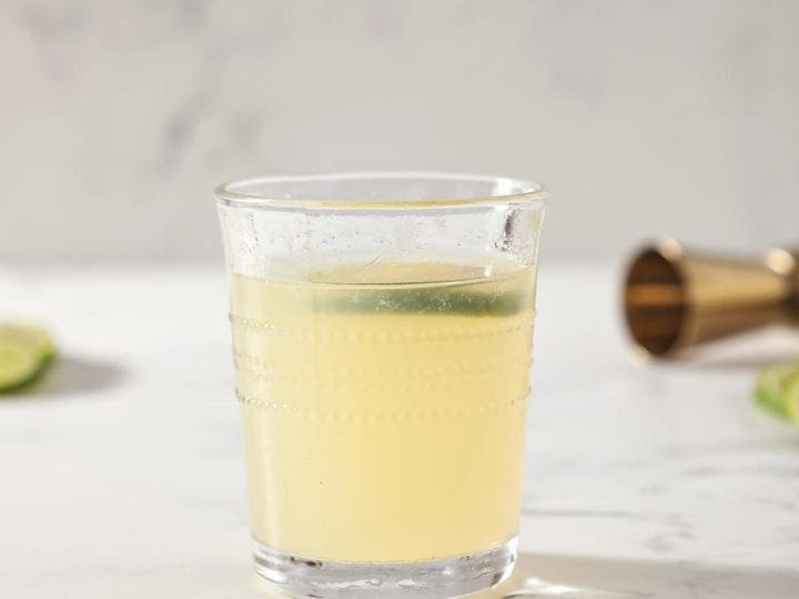 A glass of a Frozen Mule sits on a marble counter