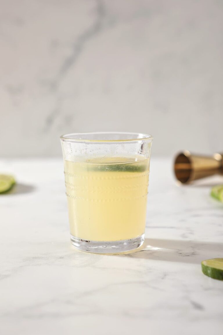 A glass of a Frozen Mule sits on a marble counter
