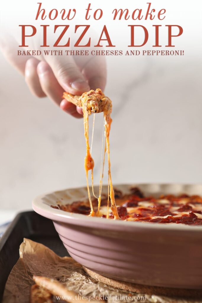 A breadstick lifts cheesy Pepperoni Dip out of a pie plate with the text 'how to make pepperoni pizza dip. baked with three cheeses and pepperoni!'