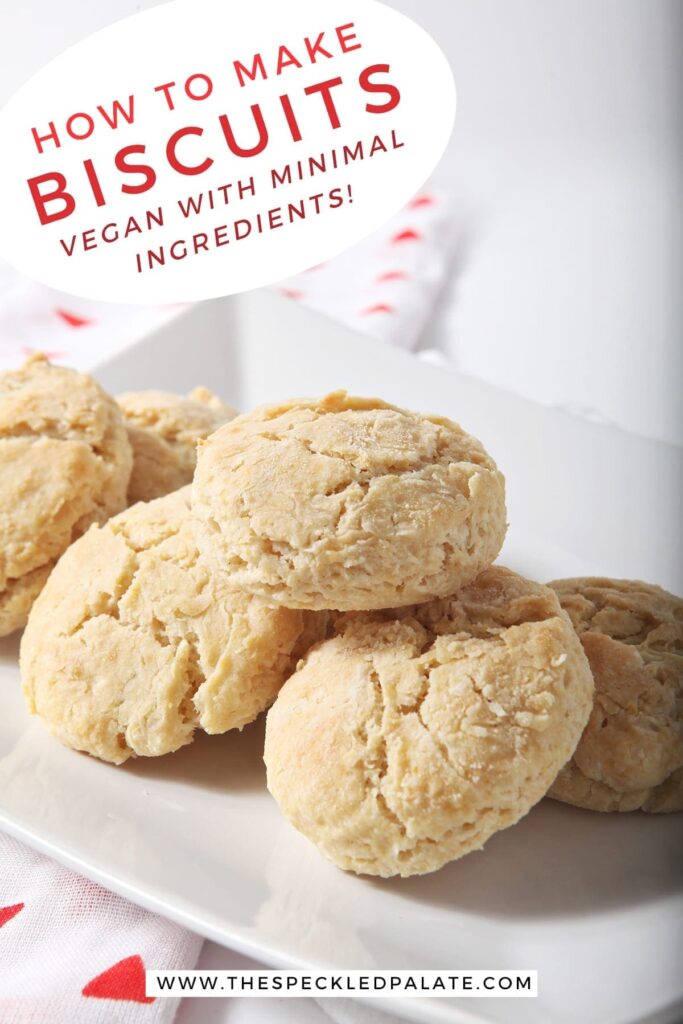 A plate of vegan biscuits on top of a red patterned towel with the text 'how to make biscuits vegan with minimal ingredients!'