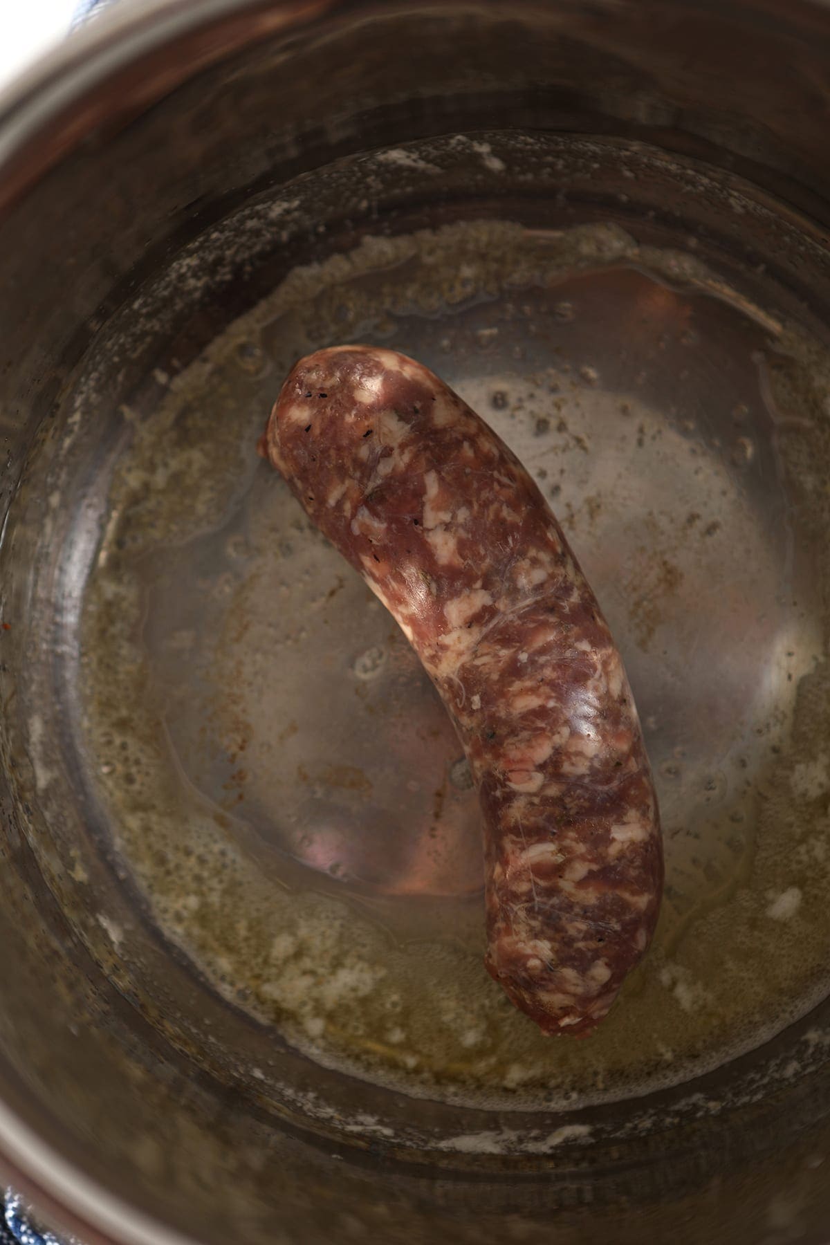 A sausage sears in butter in the Instant Pot