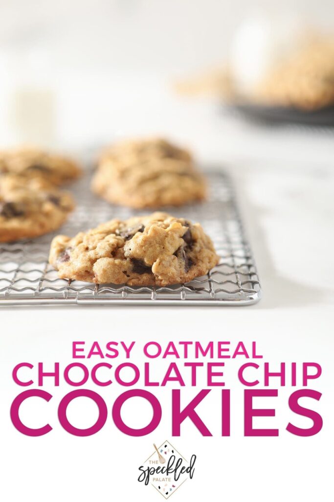 A oatmeal chocolate chip cookie on a wire cooling rack with other cookies behind it with the text 'easy oatmeal chocolate chip cookies'