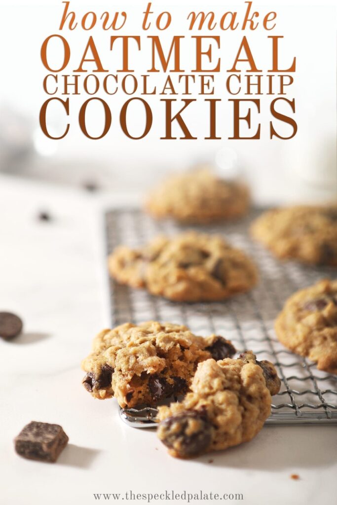 A halved oatmeal chocolate chip cookie on a wire cooling rack with other cookies behind it with the text 'how to make oatmeal chocolate chip cookies'