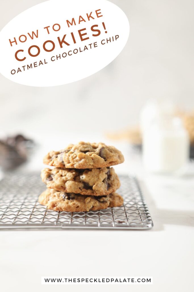 Three oatmeal chocolate chip cookies stacked on top of each other on a wire cooling rack with the text 'how to make cookies! oatmeal chocolate chip'