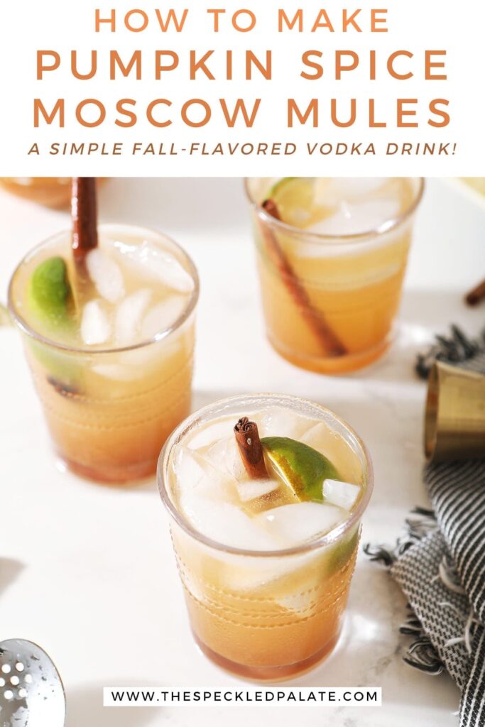 Three Pumpkin Mules, garnished with cinnamon sticks and lime wedges, on marble with the text 'how to make pumpkin spice moscow mules. a simple fall-flavored vodka drink'