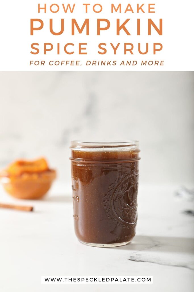 A jar of Pumpkin Spice Syrup sits on marble with a cinnamon stick and pumpkin puree behind it with the text 'how to make pumpkin spice syrup for coffee, drinks and more'