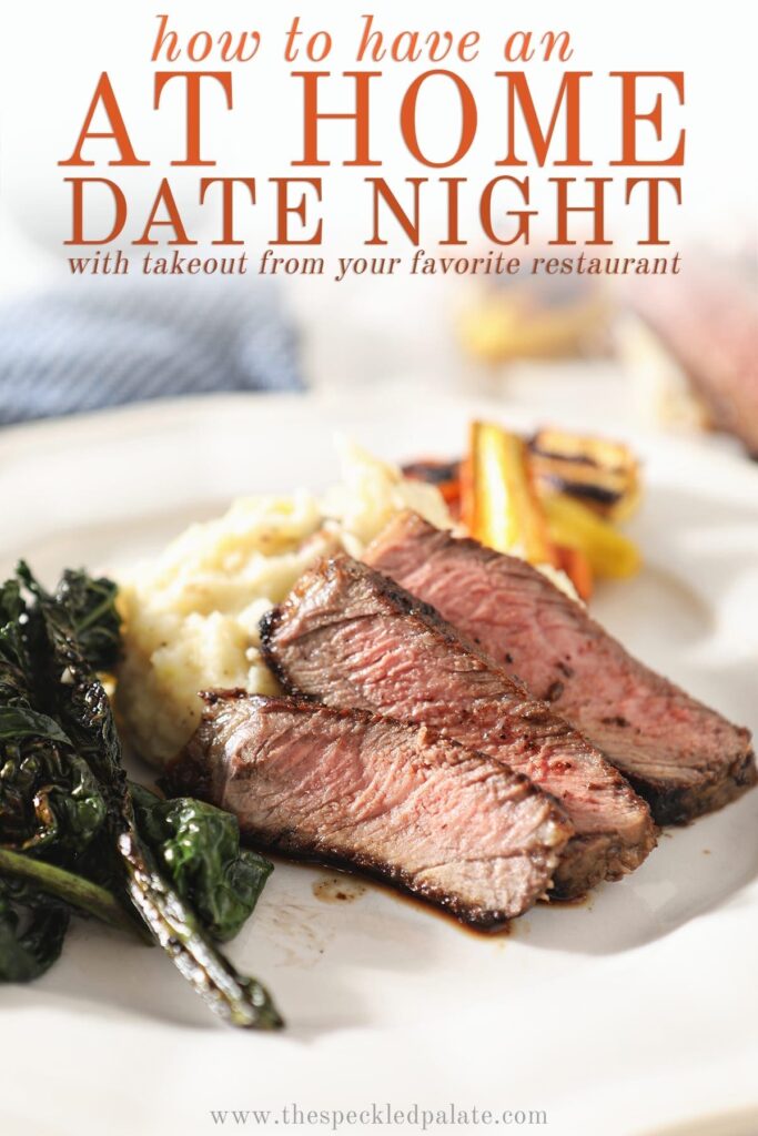 Close up of sliced ribeye on a plate with potatoes, greens and carrots with the text 'how to have an at home date night with takeout from your favorite restaurant'