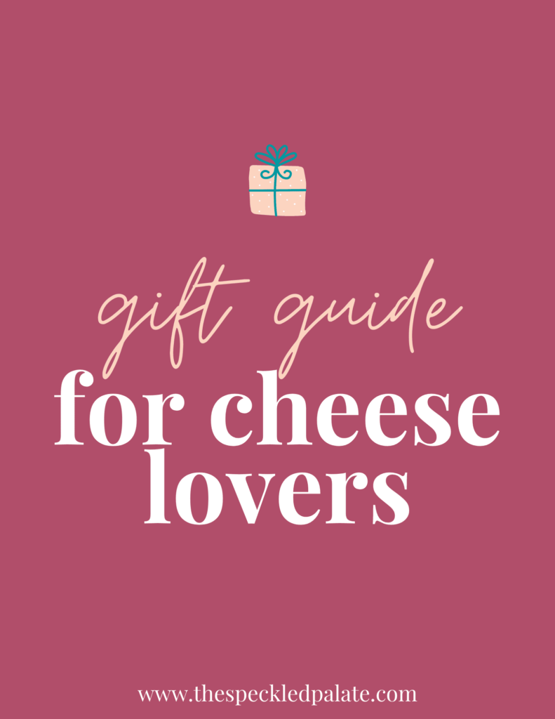 A graphic with the text 'gift guide for cheese lovers' with a colorful present on a pink background
