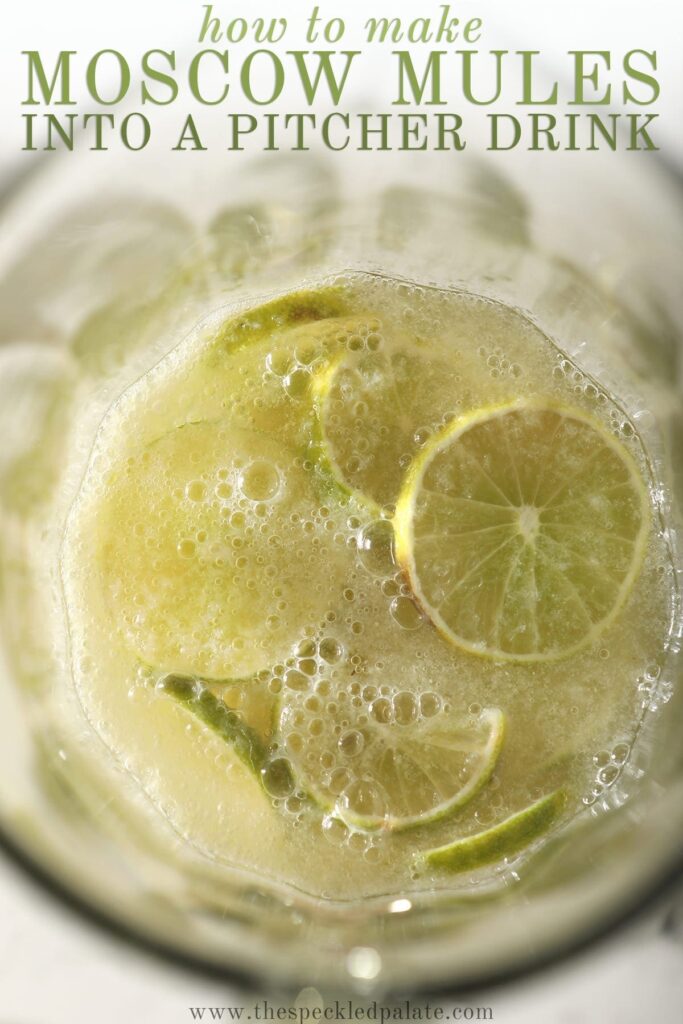 Close up of lime rounds and ingredients for a Moscow Mule pitcher with the text 'how to make moscow mules into a pitcher drink'