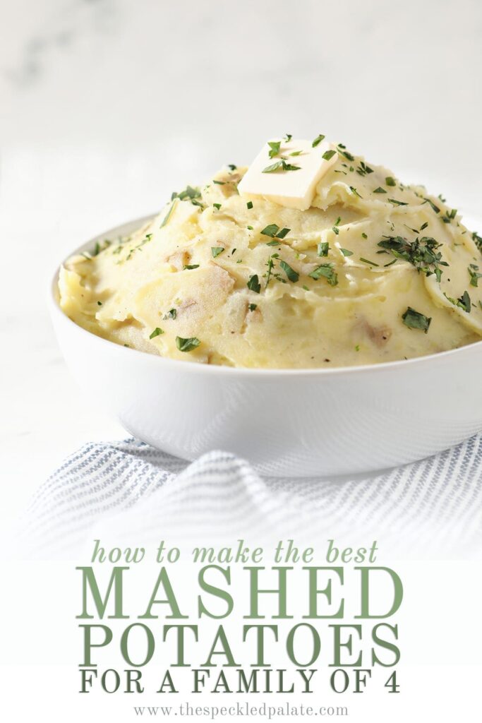 A white bowl holds a serving of creamy Homemade Mashed Potatoes while sitting on a blue and white striped towel with the text 'how to make the best mashed potatoes for a family of 4'