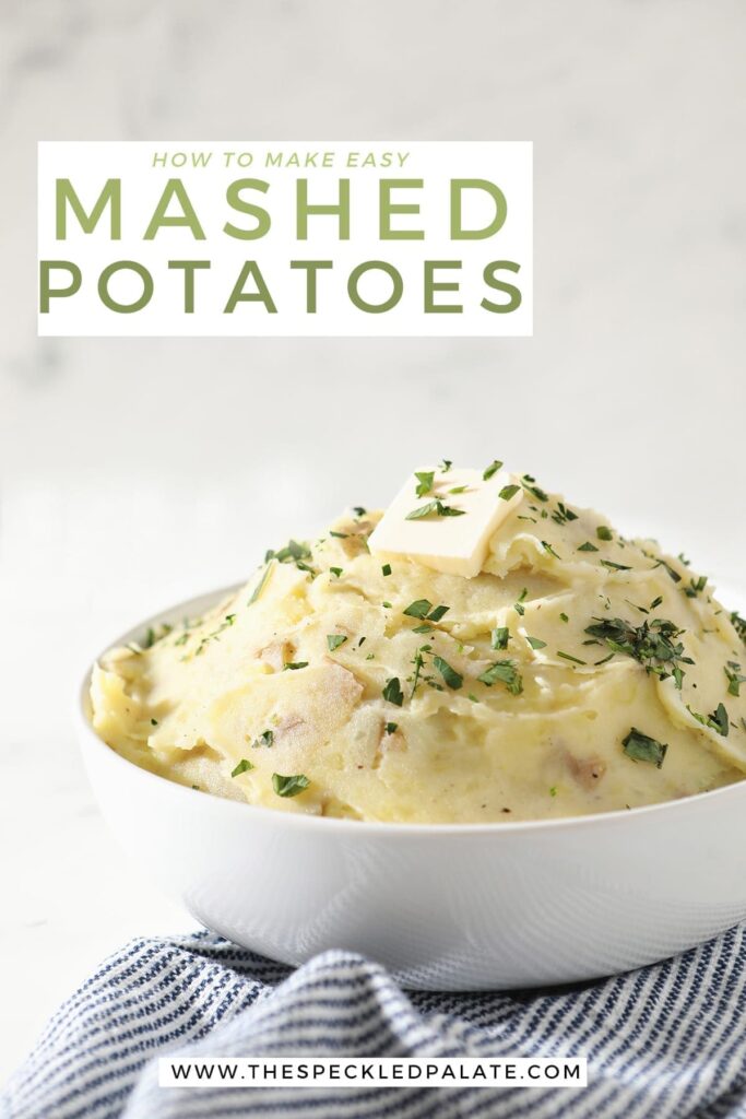 A white bowl holds a serving of creamy Homemade Mashed Potatoes while sitting on a blue and white striped towel with the text 'how to make easy mashed potatoes'