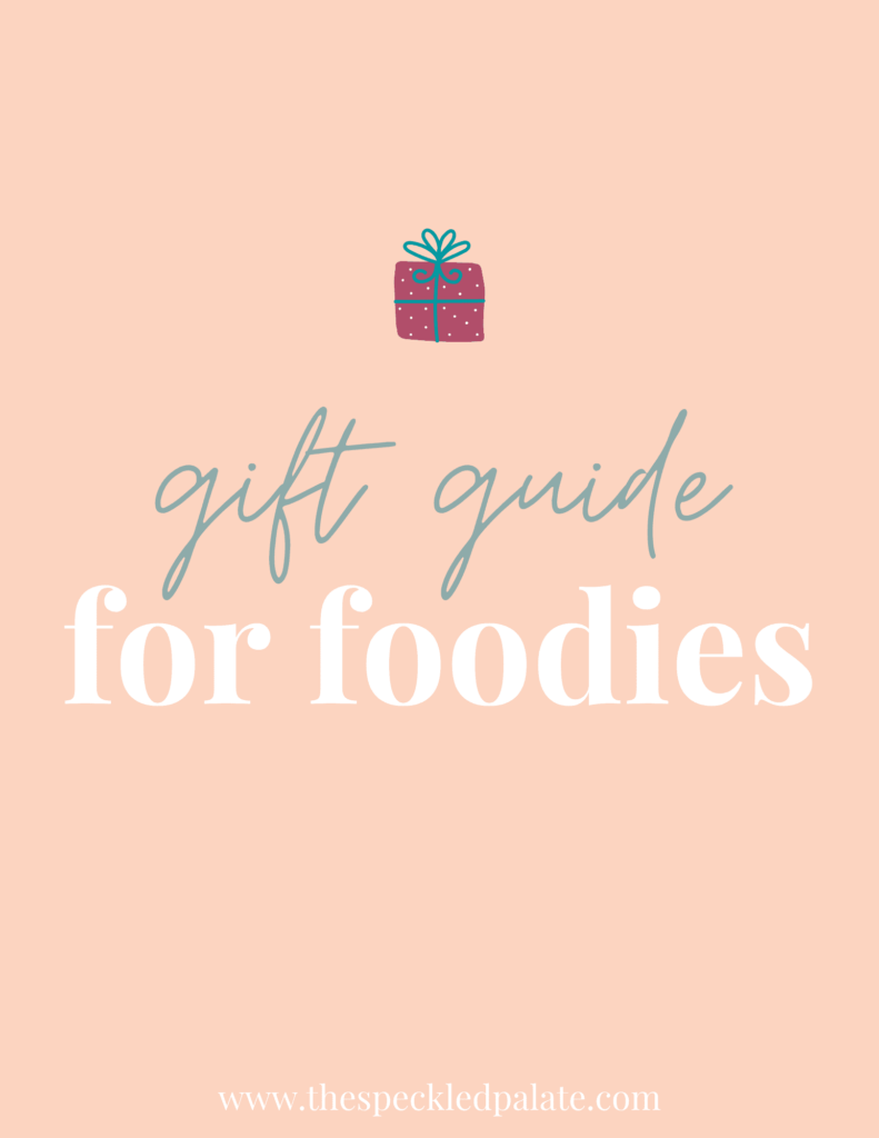 A graphic with the text Gift Guide for Foodies" next to a present on a peach background