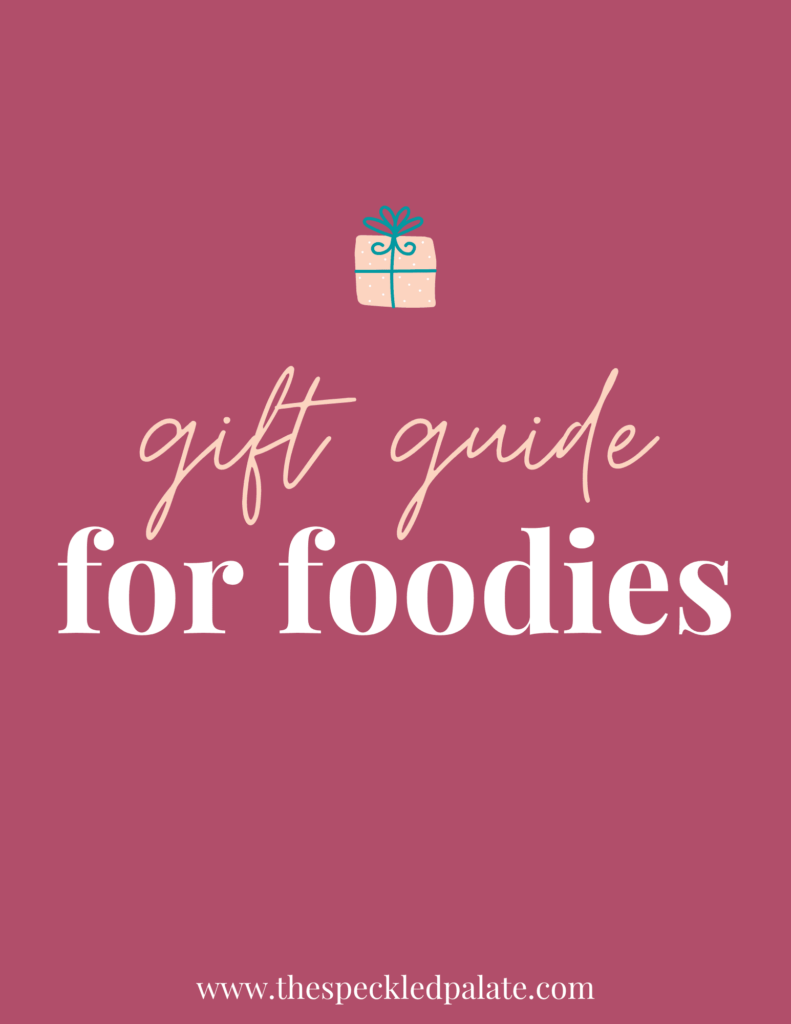 A graphic with the text Gift Guide for Foodies" next to a present on a pink background