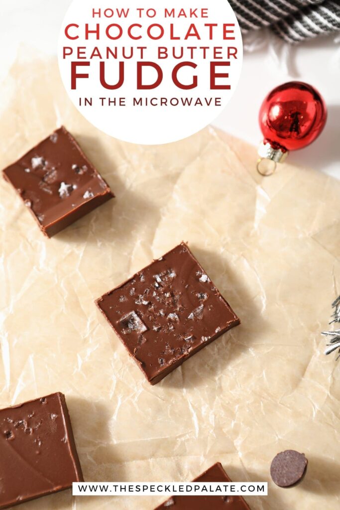 Slices of Peanut Butter Chocolate Fudge on a piece of parchment with a red ornaments and a gray and white towel with the text 'how to make chocolate peanut butter fudge in the microwave'