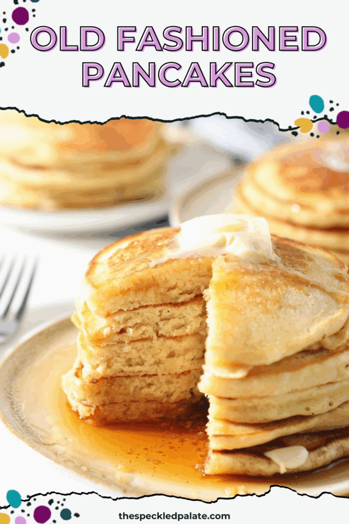 A stack of old fashioned homemade pancakes on a white plate with syrup and butter with a wedge cut out of it with the title "Old Fashioned Pancakes." This is a Pinterest Pin Image.