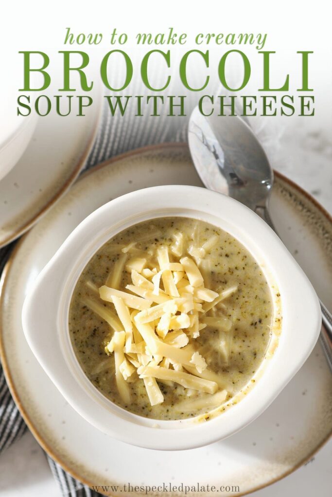 Close up of a white bowl holding a serving of Easy Broccoli Cheddar Soup garnished with additional cheese with the text 'how to make creamy broccoli soup with cheese'