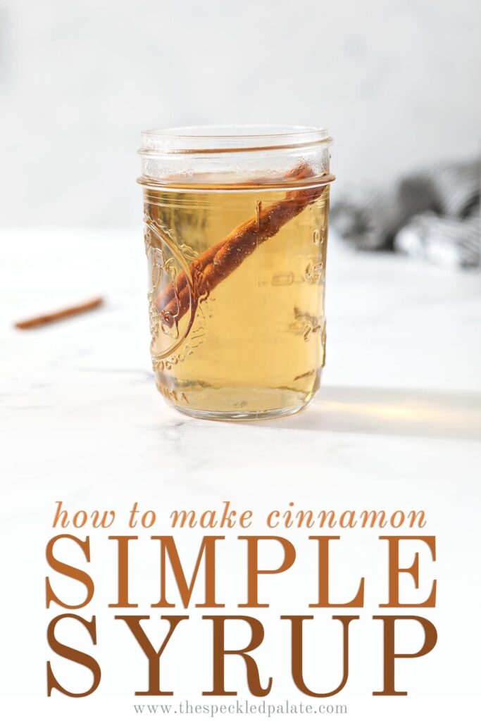 A jar holds simple syrup with cinnamon in it with the text 'how to make cinnamon simple syrup'